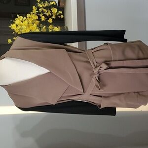 FREEWAY JACKET. CLAY COLOR with black sleeves and big pockets with tie. …